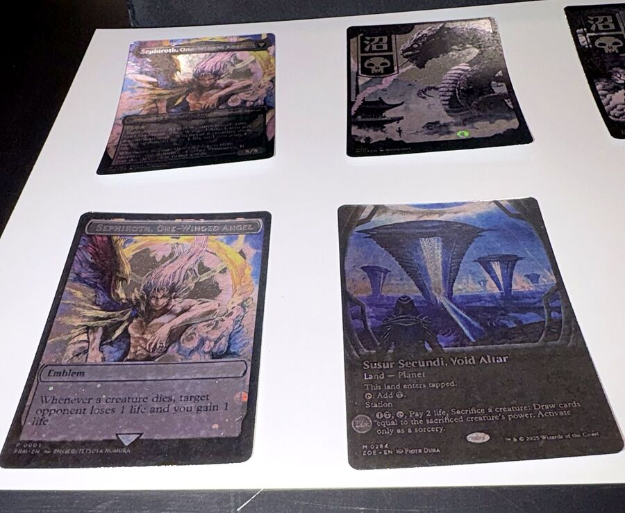 Four CLP proxy cards on a white table